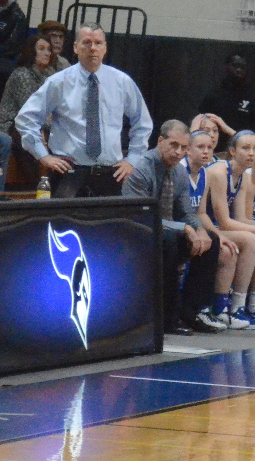 Bill Michella, right, sits behind then-Valley Central girls’ basketball coach Randy Axtell during the Section 9 Class AA championship game at Mount Saint Mary College on March 7.