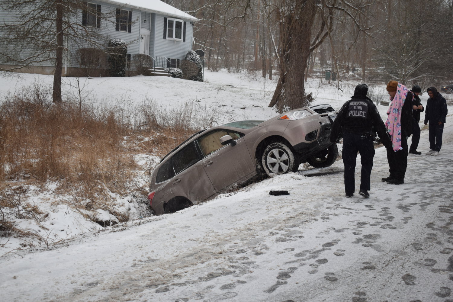 Two vehicles  ended up in a ditch, Tuesday afternoon following an accident on snow-covered Rock Cut Road