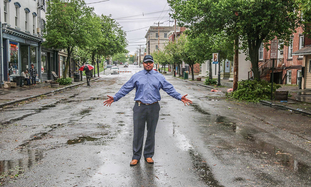 Mayor Torrance Harvey, shown in 2018 after a tornado ripped through the Liberty Street business district, is glad to see once-empty buildings occupied.