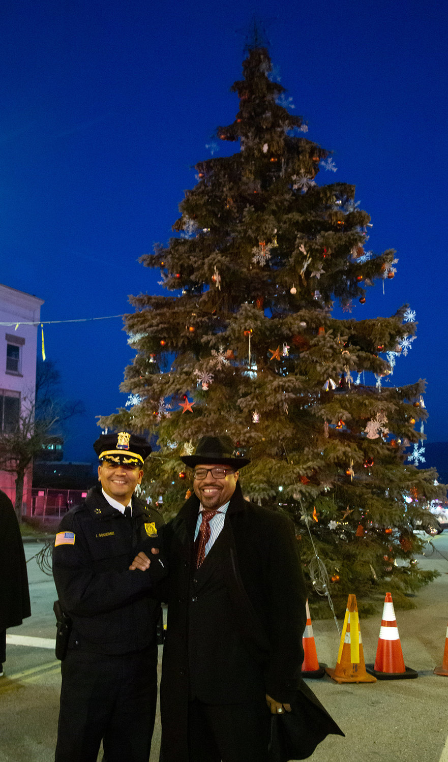 Police Commissioner Jose A. Gomerez and Mayor Torrance Harvey spread good cheer.