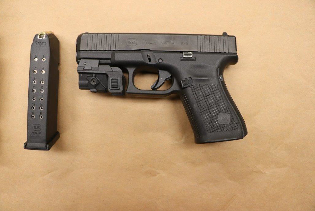 Glock 19 9mm, loaded with 8 live rounds.