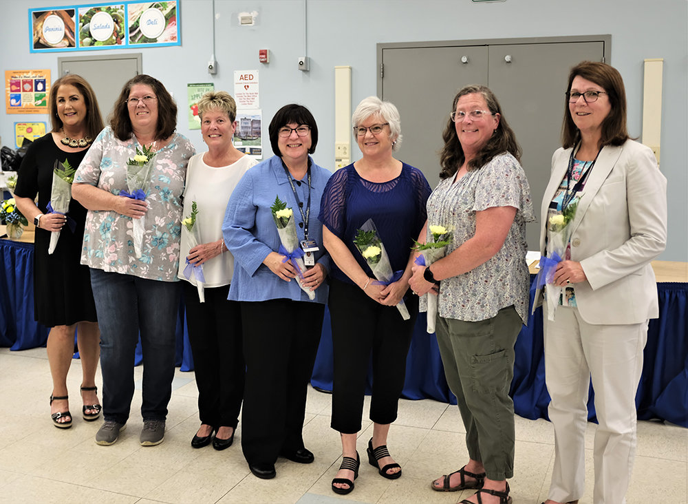 The School Board honored employees who are retiring this year, who have served the district for a combined total of 284 years: L-R Annmarie Trank (30 years); Jamie Riley (30); Nancy Jensen (20); Maria McCarthy (24); MaryAnne Lostaglio (23); Kathleen DiSciullo (14.5) and Carol Potash (12).
Absent were Karen Rogner (22); Elise Horn (13); Jim Moriarty (28); Dan Lynn (26); Linda Madden (26.5) and Peg Creamer (14).