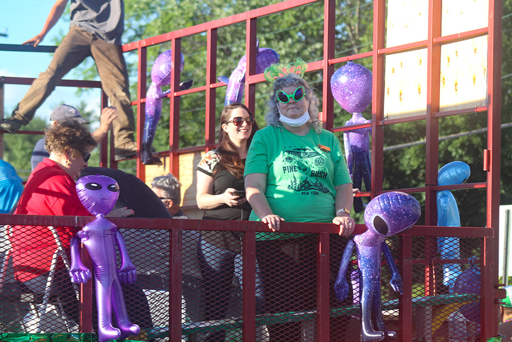 Pine Bush and aliens were represented in the Mardi Gras Parade. They were honored with the trophy for Most Humorous float.