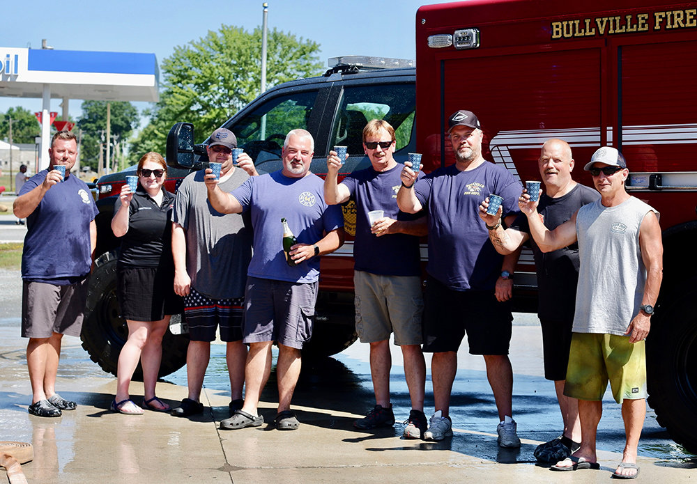 Members of Bullville Fire Dept. celebrating their new addition to the fleet. Chief Bill Bacon, Lieutenant Eric Grunwald, Chief Wayne Melton, Chairmen of fire commissioners Bruce Guttenplan, Lieutenant Dominick Zigrossi, and other members.