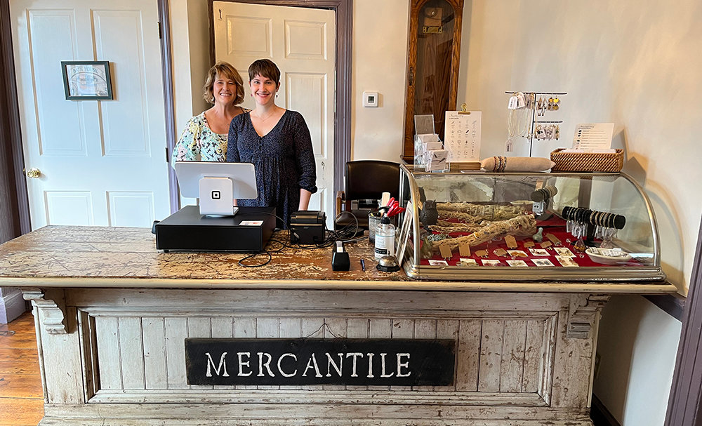Owners Marlene Wood and Taylor Raimundo inside of their brand new shop.