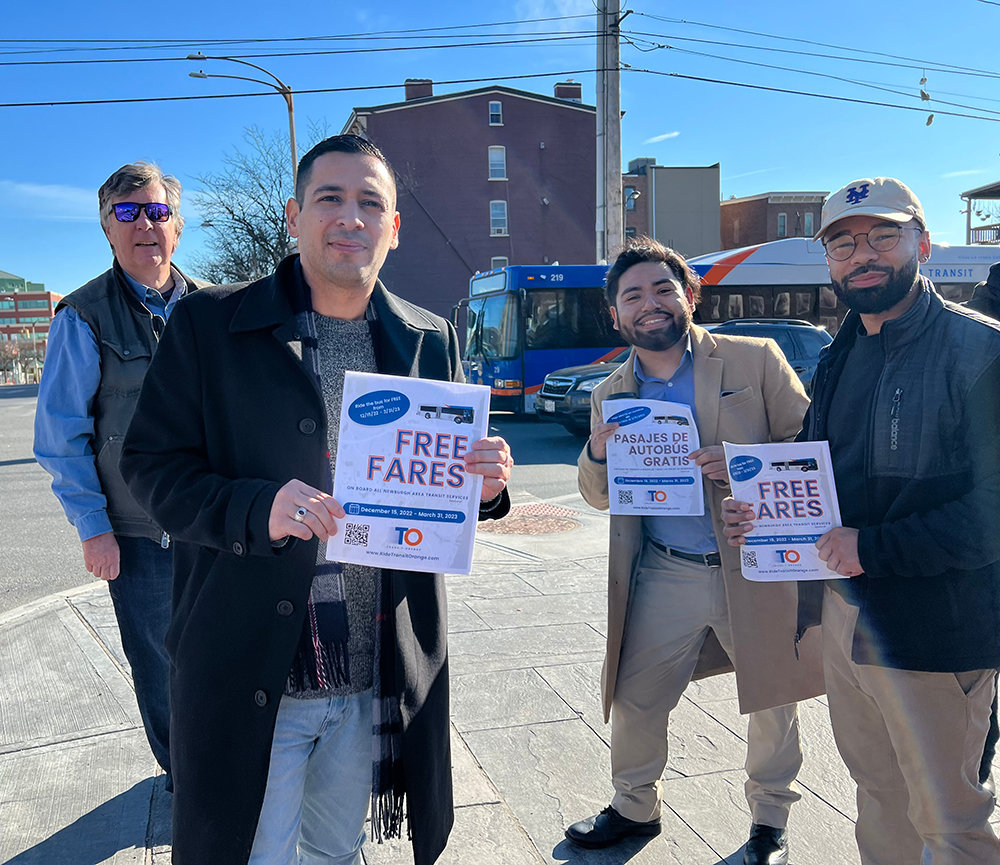 [L-R] Councilman Bob Sklarz, Orange County Legislator Kevindaryán Luján, City Council At-Large Candidate Bryan Luna and Steven Majano are ready to set off on the bus and spread the word about free fares.