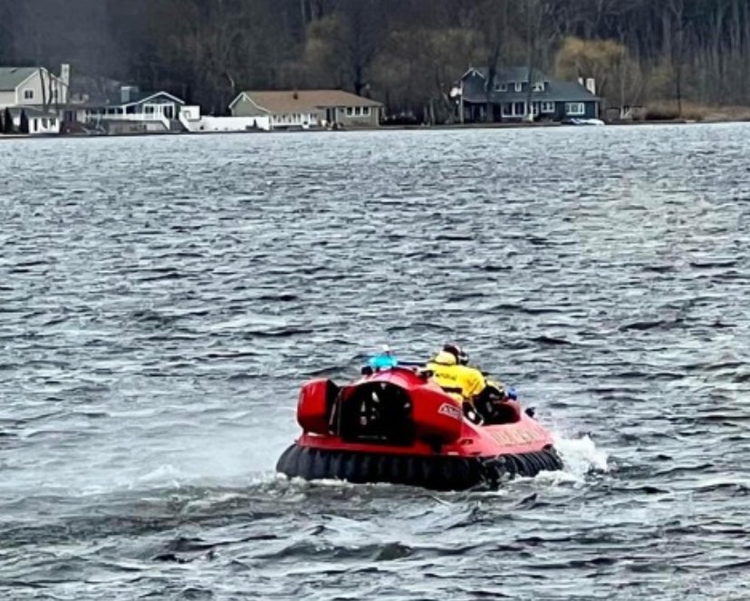 Orange Lake firefighters are sent out on a hovercraft to assist the capsized boaters.