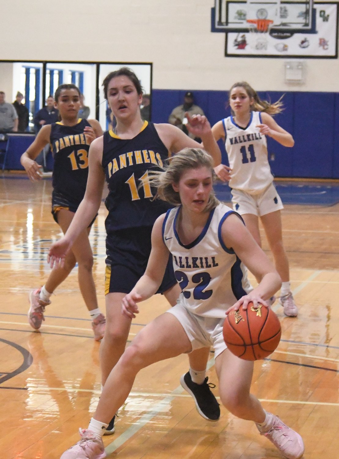 Wallkill's Emma Spindler dribbles the ball as Walter Panas' Sarah Chiulli defends and Sophia Tavarez and Wallkill's Zoe Mesuch look on during Saturday's NYSPHSAA Class A regional final at Mount Saint Mary College in Newburgh.