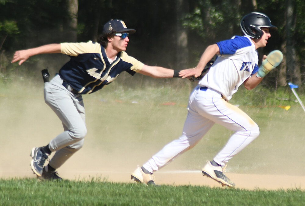 Valley Central's Will Quinn is tagged out by Newburgh third baseman Jadin O'Neill in a rundown during Wednesday's OCIAA crossover baseball game at Valley Central High School in Montgomery.