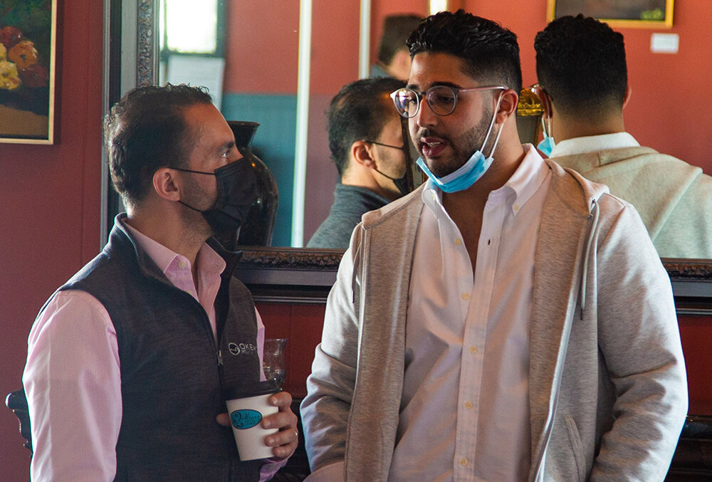 Adam Shayanfekr [right], Executive Director and Co-Founder of Seraphim Equities, during a speaking engagement with other community groups in March of 2021.