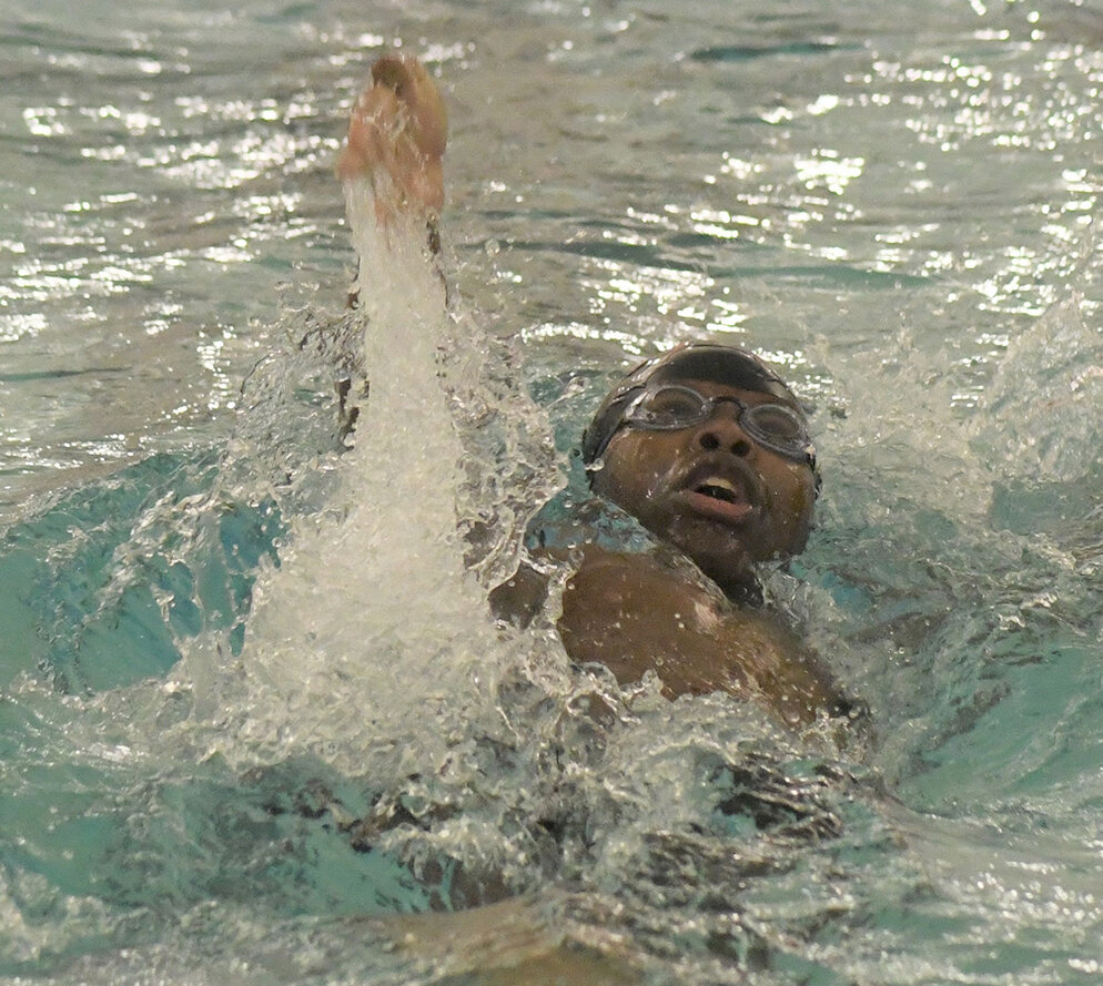 Marlboro’s Josh Johnson swims the 100-yard backstroke during an OCIAA boys’ swimming meet on Dec. 19, 2023.